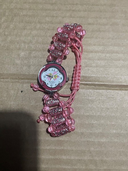 Bofenc children's flower shaped pink quartz watch.
